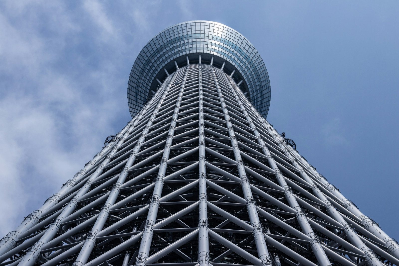 grey tower with round top under grey cloudy sky